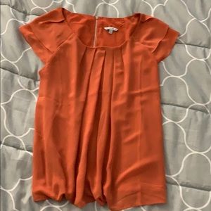 Naked Zebra, sz S top in pumpkin-perfect orange!